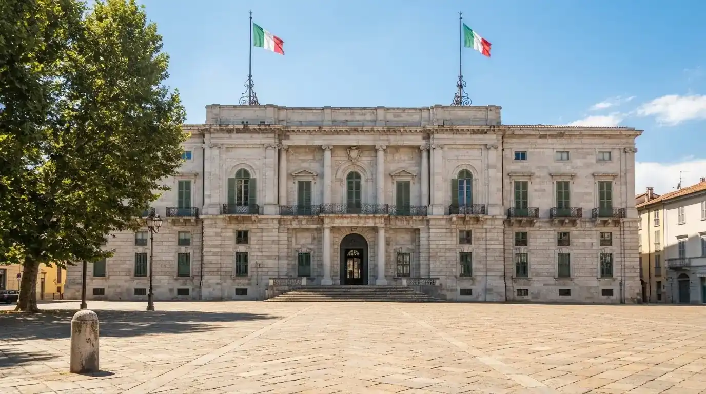 Palazzo istituzionale con bandiere al vento in una piazza soleggiata — casino online italiani senza autoesclusione